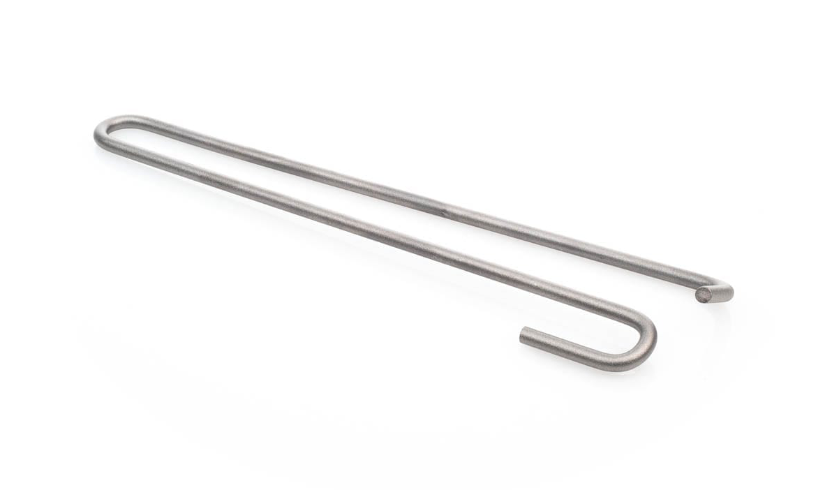 A torsion bar spring, a silver metal hook with a U-shaped bend resting on a white background.