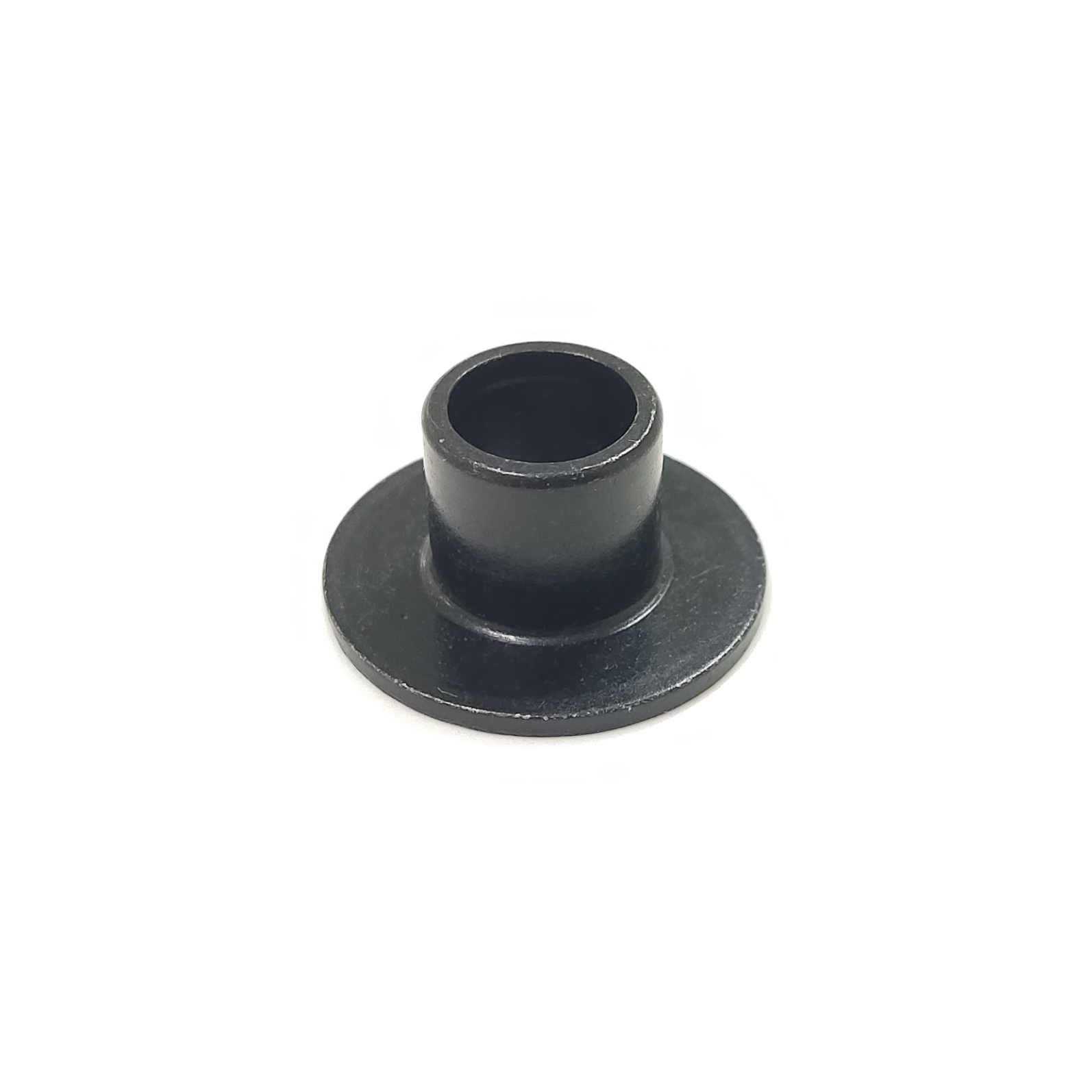 Black cup-shaped metal component with a flat flange against a white background.